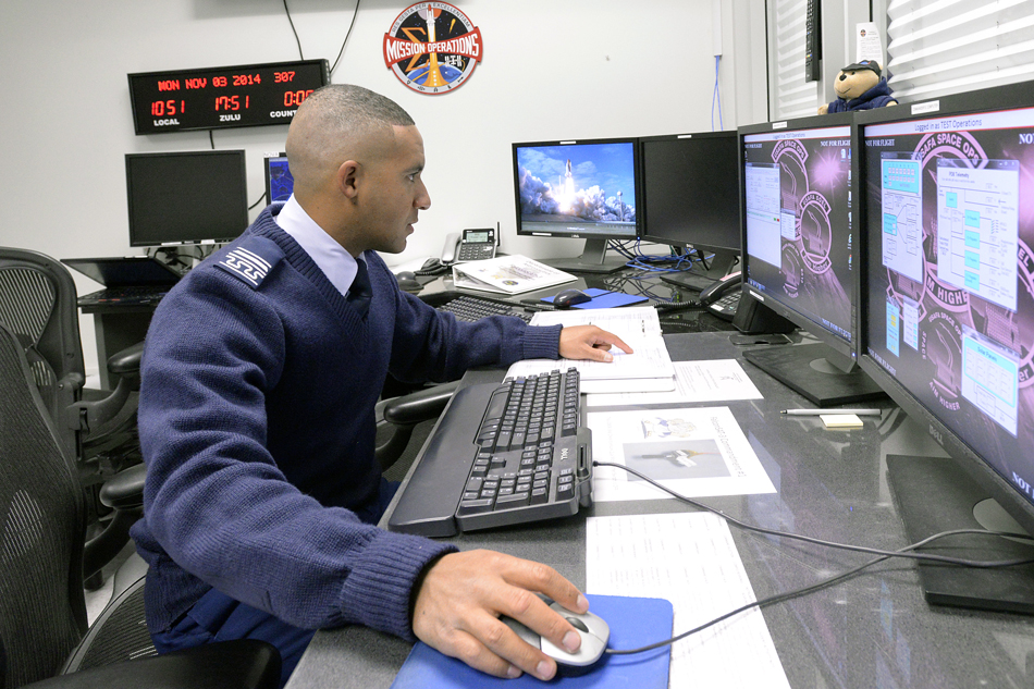 First class cadet in the FALCONSAT mission control room – the class where they fly a USAFA-designed satellite.